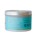 Ein tealfarbenes metallisches zylinderförmiges cacao lab tin mit silbernem deckel und veganem, single-origin arriba nacional kakao wasser element blend