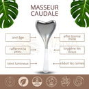 Silberner herzförmiger gua sha massager aus edelstahl mit weißem griff für lymphdrainage und gesichtskonturen von masseur caudale