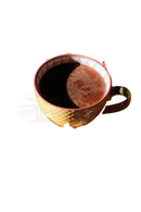 A ceramic coffee cup with red rim and diamond pattern filled with dark liquid from ayamani naturals pilz mocha mischung reishi