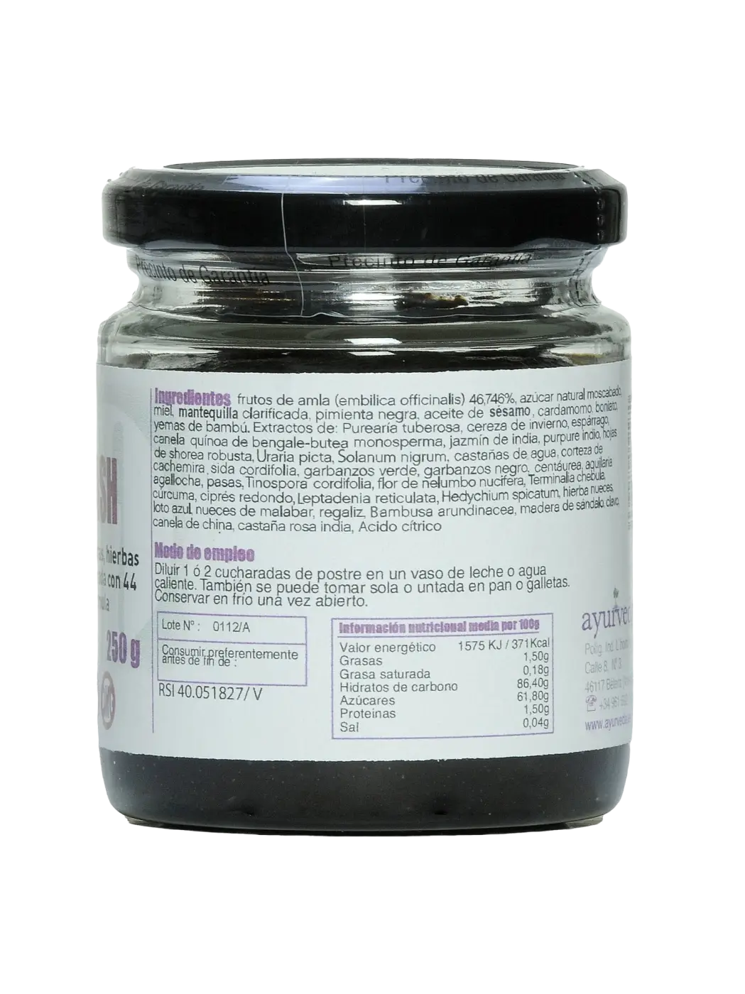 Ein glas mit schwarzem deckel enthält ein dunkelbraunes chyawanprash traditionelles ayurvedisches elixier mit amla-frucht