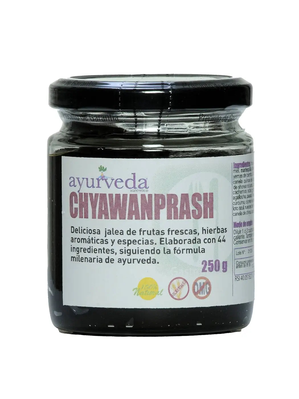 Ein glas mit schwarzem deckel und weißem etikett enthält dunkles chyawanprash paste als traditionelles ayurvedisches elixier mit amla