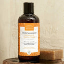 Dark amber glasflasche duschöl bio orange feigenbaum mit schwarzem verschluss und elegantem label für hautgefühl