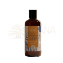 Braune glasflasche mit schwarzem deckel und orangem blauem label comptoir des huiles reparierende haarspülung mit ximenia öl
