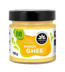 Ein glas mit cosmoveda kokos ghee in einem schwarzen deckel und gelbem etikett erhältlich bei mana