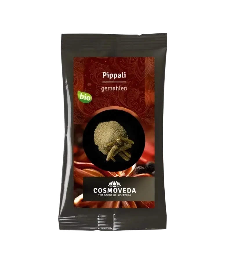 Gemahlenes Pippali von Cosmoveda, Bio-Langpfeffer für Stoffwechsel und Immunabwehr, in einer offenen Gewürzdose.