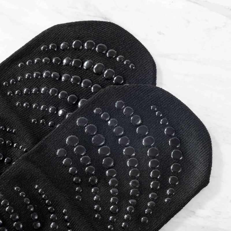 Chaussettes de yoga dos nu avec bretelles croisées et poignées — antidérapantes