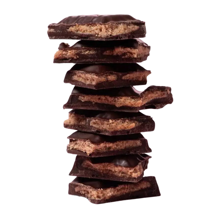 Dalikao Feel Good Anti-Stress-Schokolade mit 70 % Kakao, Praliné und Haselnüsse, glatt und schmelzend in der Hand gehalten.
