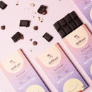 Dalikao Feel Good Anti-Stress-Schokolade mit 70% Kakao, Praliné-Haselnüsse, Delikao Süßigkeiten & Snacks, Schokoladenstück im Bild