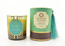 Dessauer Duftkerze Pitta Aqua Oud, Räucherware in einer eleganten Kerze mit frischen, holzigen Aromen, sichtbare Kerze in einem Glas.