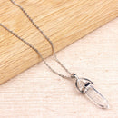 Collier plaqué argent — pendentif en quartz transparent