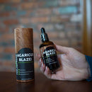 Agaricus Blazei Pilz-Flüssigergänzung von Feel Supreme in einer braunen Flasche mit Tropfensystem, Nahaufnahme der Verpackung.