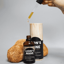Lions Mane Löwenmähne Vitalpilzflüssigkeit von Feel Supreme, Naturprodukt mit weißen Pilzen in einer Flasche, für geistige Klarheit