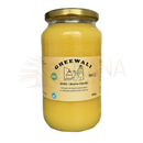 Ein glas mit golddeckel enthält 900g goldenes gheewali alpen-ghee traditionell geklärt bio aus schweizer weidemilch