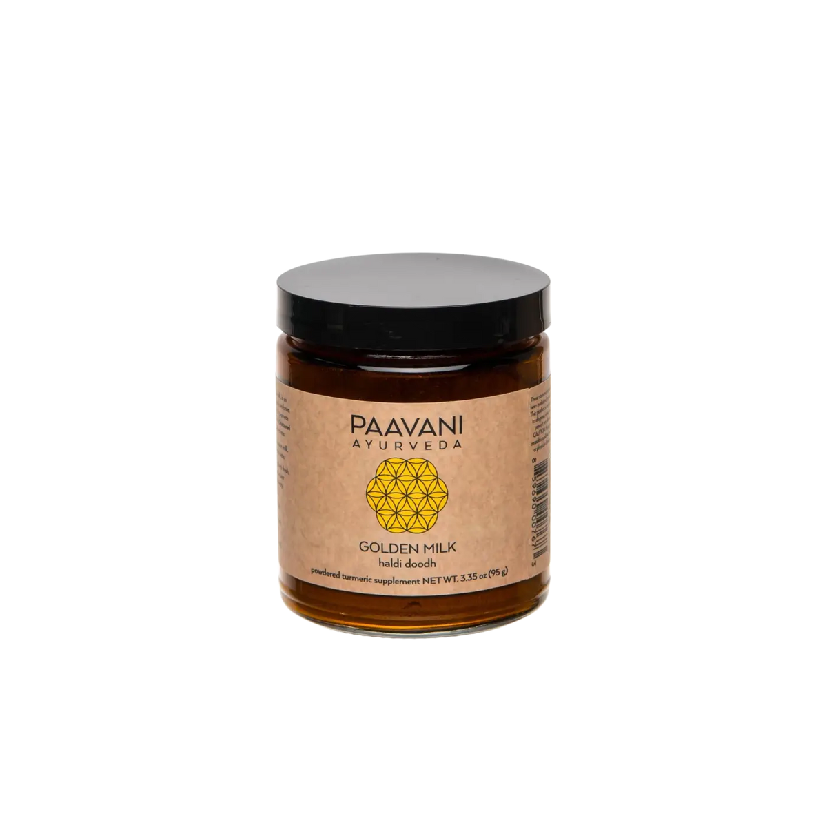 Goldene Milch von PAAVANI Ayurveda mit Kurkuma, Ingwer und Zimt in einem Glas, sichtbar in der Abbildung