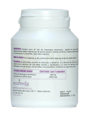 Weiße plastikflasche mit weißem schraubverschluss, etikettiert ayurveda, goldener shilajit kapseln mit ashwagandha von mana shop