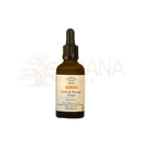 Ein dunkelbernsteinfarbenes glasfläschchen mit schwarzem pipettenverschluss und etikett huile de massage visage von comptoir des huiles für intensive pflege mit moringa drouhardii-öl im mana shop