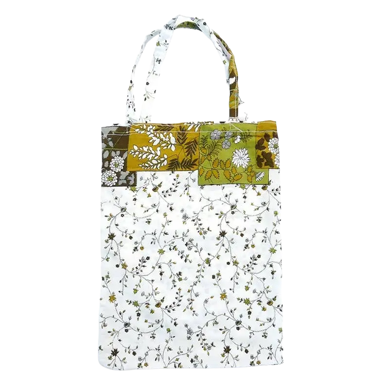 Große Stofftasche aus Jute von Vives de la Cortada S.L, mit bunter Patchwork-Optik, umweltfreundlich und langlebig.