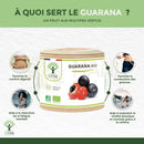 Ein zylindrischer behälter guarana bio kapseln für energie mit naturholzdeckel und grünem etikett von mana shop