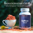 Weiße plastikflasche harmonify safranextrakt mit dunkelblauem etikett und weißen veganen kapseln aus crocus sativus