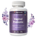 Eine weiße plastikflasche mit lila etikett und weißen kapselfür harmonify vaginale probiotische kapseln für tägliches weibliches gleichgewicht