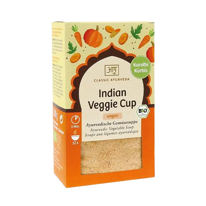 Bio Indian Veggie Cup von Classic Ayurveda mit buntem Gemüse, Getreide und Hülsenfrüchten in lebendigen Orangetönen