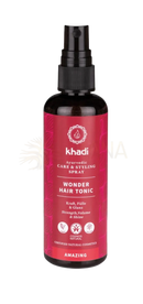 Ein eleganter schwarzer sprayflasche mit rotem label khadi wonder hair tonic ayurvedische medizinische kräuter mana shop