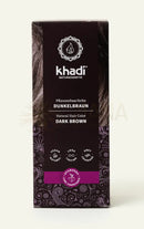 Khadi natürliche Pflanzenhaarfarbe Dunkelbraun, 100 g, zeigt die Verpackung und die Textur der natürlichen Haarfarbe für Haare.