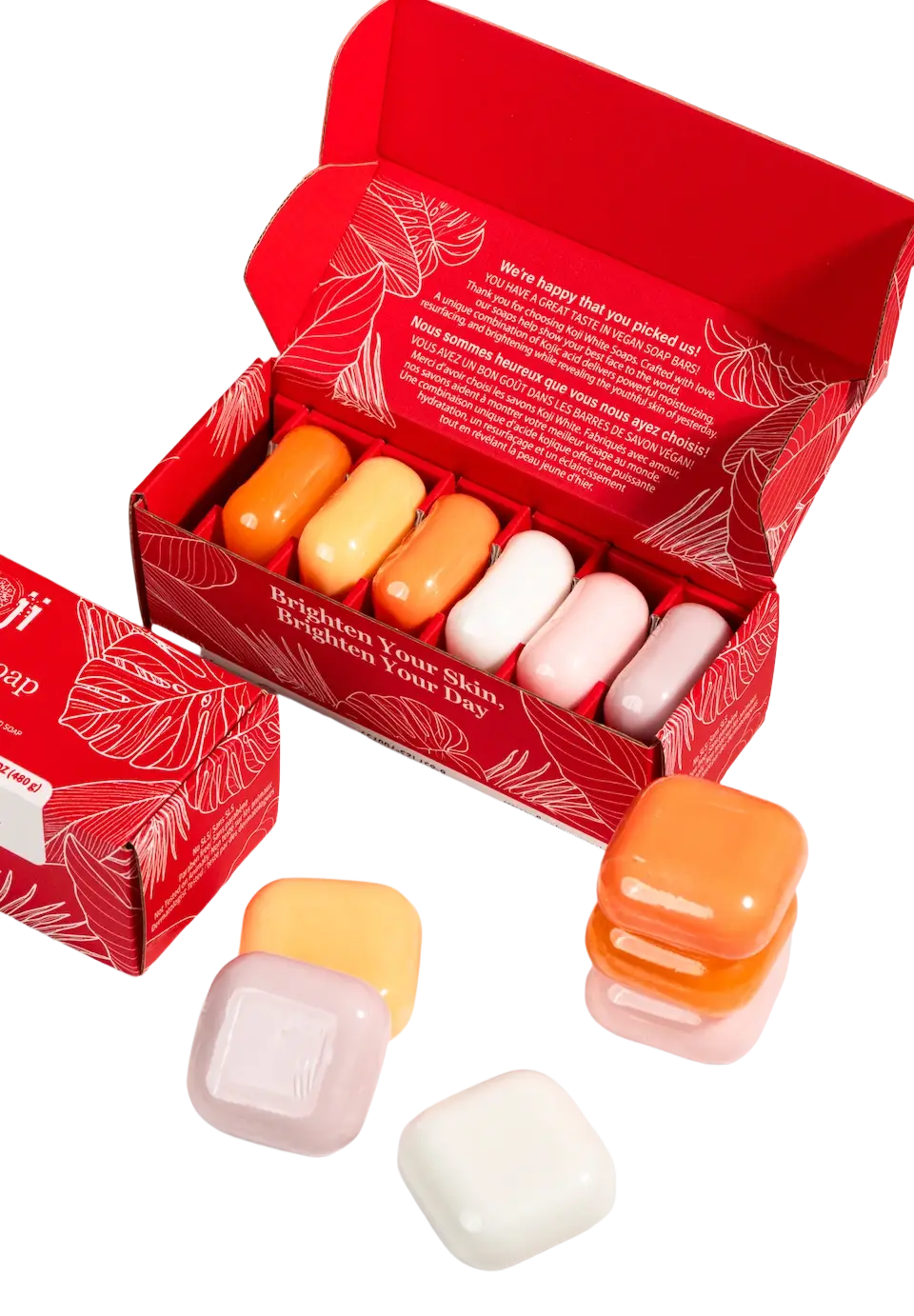 Koji White Geschenk-Set mit hautaufhellender Seife und Kojisäure, zeigt die Seife und Verpackung in einem stilvollen Set.