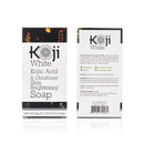 Koji White Hautaufhellungsseife mit Kojic-Säure und Glutathion, Gesicht, zeigt die weiße Seife mit Verpackung vor einem weißen Hintergrund