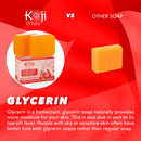 Koji white kojic acid dark spot corrector soap orange bar with two bars and branded packaging for dunkle flecken