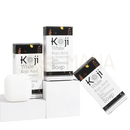 Weißer rechteckiger koji white seifenriegel mit kojic acid und glutathion in schwarz-weiß verpackung mit floralen akzenten, geeignet zur hautaufhellung