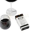 Koji white hautaufhellungsseife mit kojicsäure und glutathion in schwarzer und weißer verpackung mit floralen akzenten suitable for helle haut