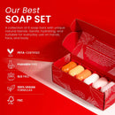 Ein lebhaft rotes geschenkset mit sechs ovalen seifenstücken in orange, gelb und weiß von koji white mit kojicsäure