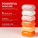 Stack von sechs pastellfarbenen ovalen seifen mit glänzender oberfläche im koji white kojic acid hautaufhellende geschenkset