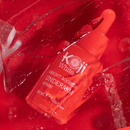 Koji White Bright Booster Achselserum in einer weißen Flasche mit Applikator, Körperpflege gegen dunkle Achseln, close-up auf Produkt.