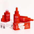 Koji White Bright Booster Achselserum in einer weißen Flasche mit Dosierspender, für Körperpflege und Hautaufhellung.