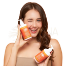 Orangenweiße pumpflasche der koji white körperlotion mit kojic acid für hautpflege im doppelpack 2 × 250 ml