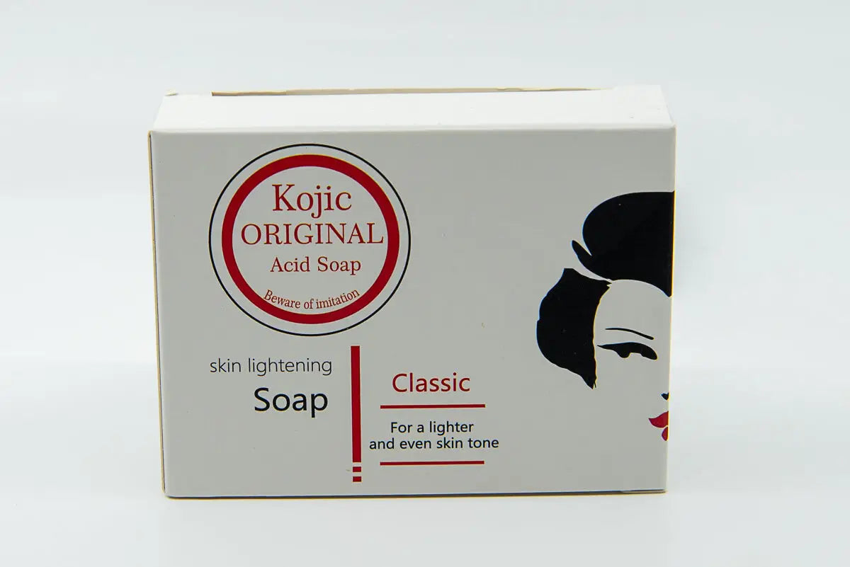 Afinity Care Kojic Original Acid Gesichtsseife für einen ebenmäßigen Teint, weiße Seife mit Kojic Acid auf dunklem Hintergrund