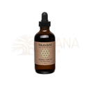 Braune glasflasche mit schwarzem tropfverschluss und paavani ayurveda kräuter haaröl für kopfhaut und haar mit zedernholzöl