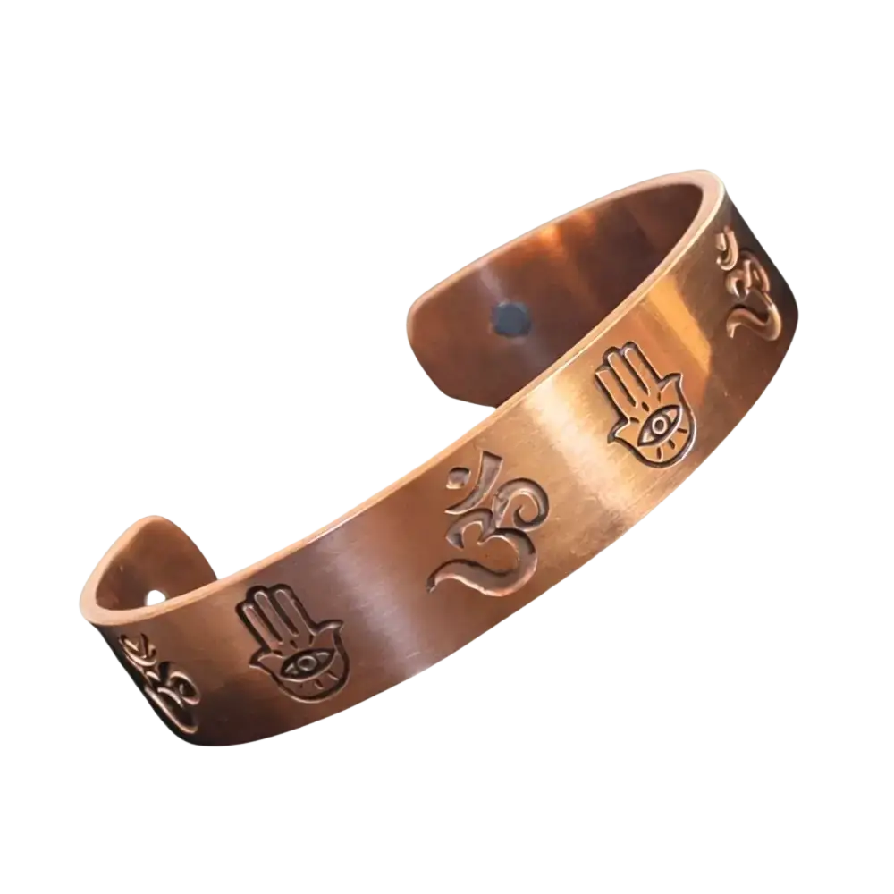 Kupferarmband Om & Hamsa mit 2 Magneten, handgefertigter Ayurveda Specialist B.V. Armband aus kupferfarbenem Metall.