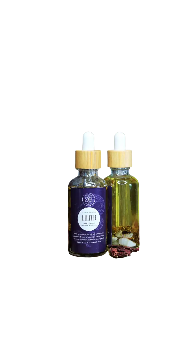 Ätherisches Lilith Öl von Ayamani Naturals mit Mondstein- und Tigeraugenkristallen, für feminines Ritual und spirituelle Praxis.