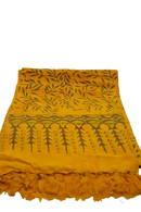 Vibranter gelber lunghi sarong pareo tuch mit dunkelgrünem botanikmuster und fransen von mana shop