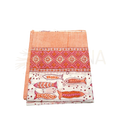 Folding of a vibrant lunghi sarong with orange and pink fish motifs on white ground from mana shop