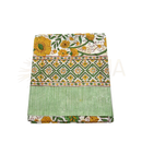 Folding of a cotton lunghi sarong with vibrant yellow and green floral motifs and geometric stripes from mana shop