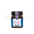 Ein braunes glasgefäß mit schwarzem deckel und dekorativem etikettdesign mit himalaya bergmotiv mad honey nepal 150 g