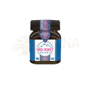 Ein braunes glas mit schwarzem deckel und blauem etiket mit pinkem text mad honey nepal von mana shop