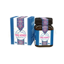 Ein braunes glasgefäß mit schwarzem deckel und blau-weiß-pink gemustertem etikett mad honey nepal himalayan cliff honey