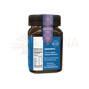 Braunes mad honey nepal glas mit schwarzem gewindedeckel und dekorativem band mit traditionellen geometrischen mustern