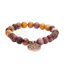 Mala armband mit polierten maron- und bernsteinfarbenen steinen und kupferfarbenem blume des lebens anhänger von mana shop