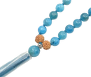 Türkisblaue Mala-Kette aus Apatit mit schimmernden Perlen, von GangaPrem, handgefertigter Schmuck für Meditation und Stil.